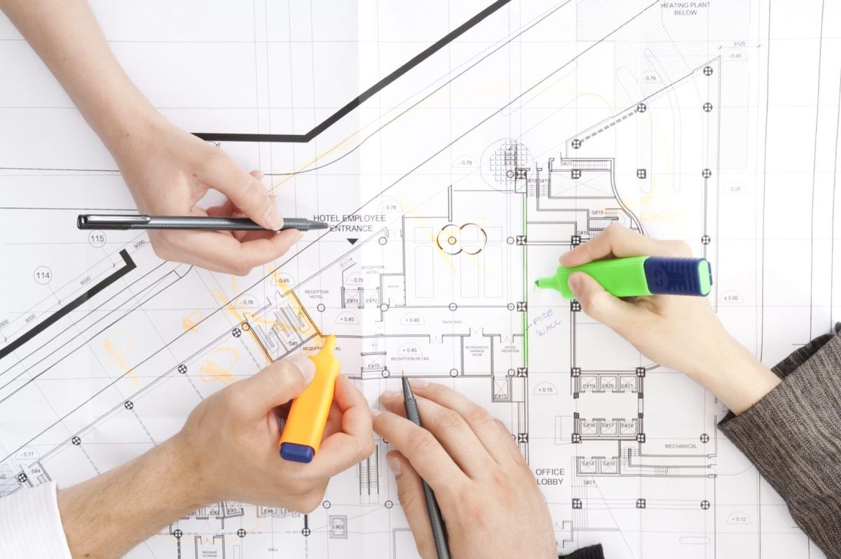 Planning drawings being marked up